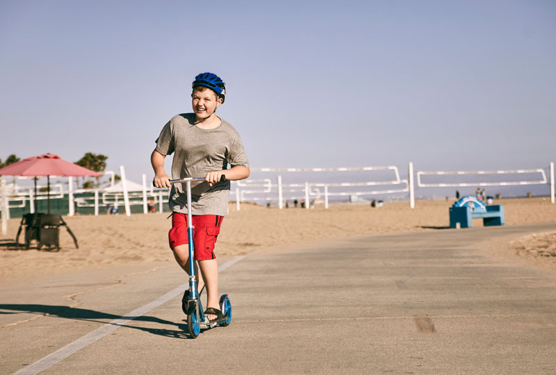 Happy Boy on Scooter