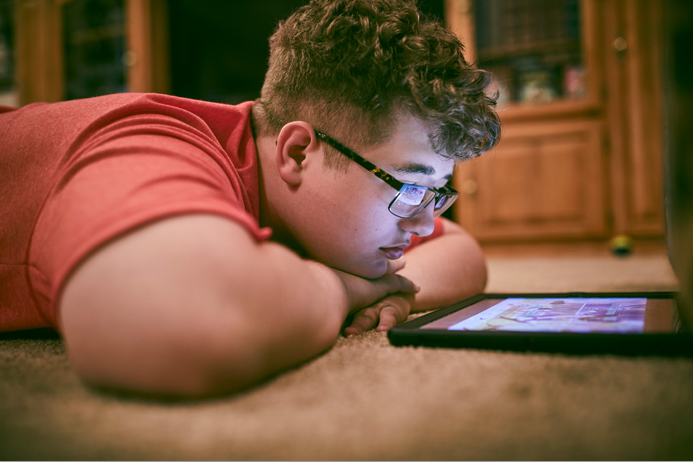 Boy Looking at Monitor