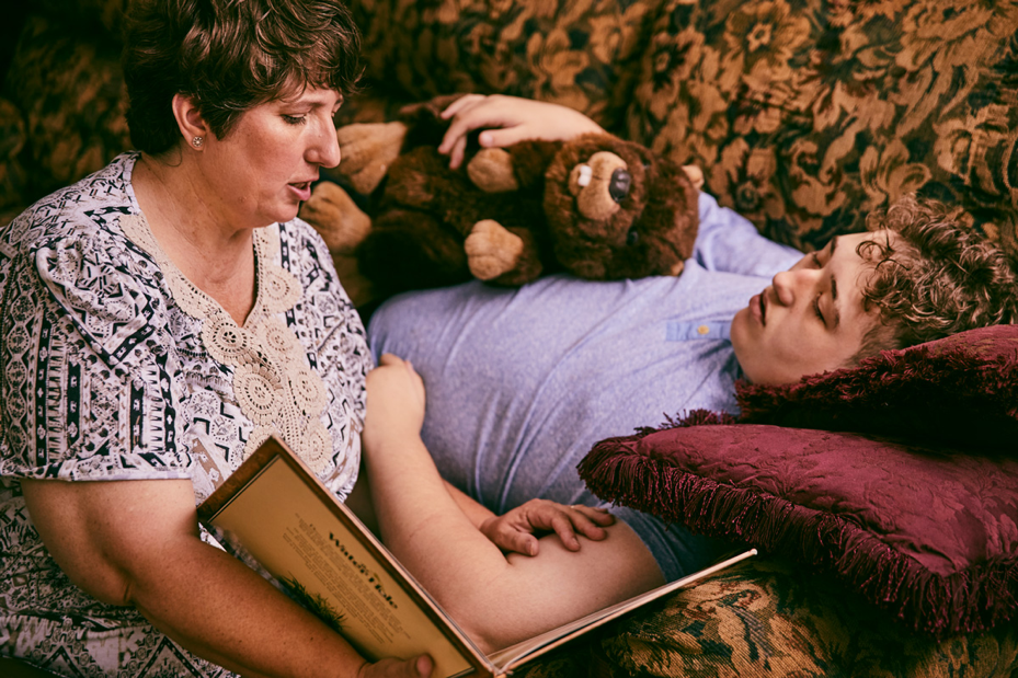 Mom Reading Son a Story