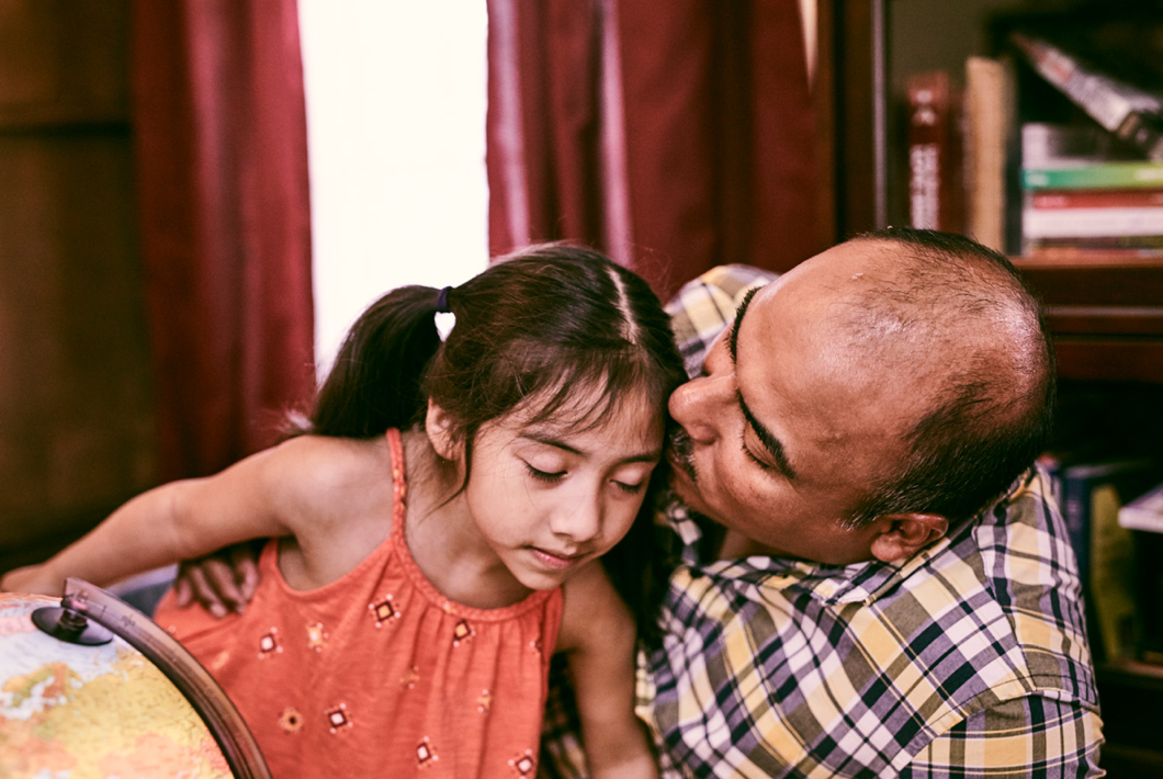 Dad Hugging Daughter