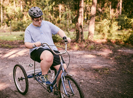 Boy Riding Bicycle