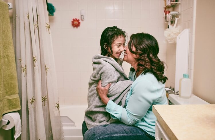 Girl Hugging Mom