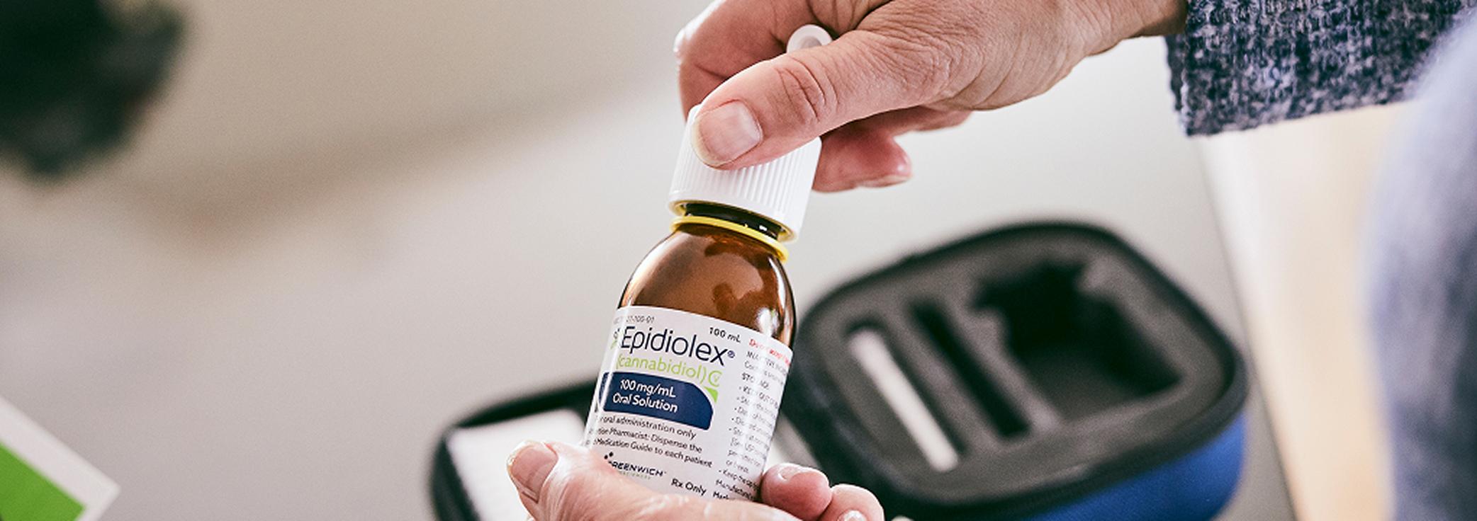 EPIDIOLEX® (cannabidiol) FDA approved prescription CBD medicine glass amber bottle and travel case