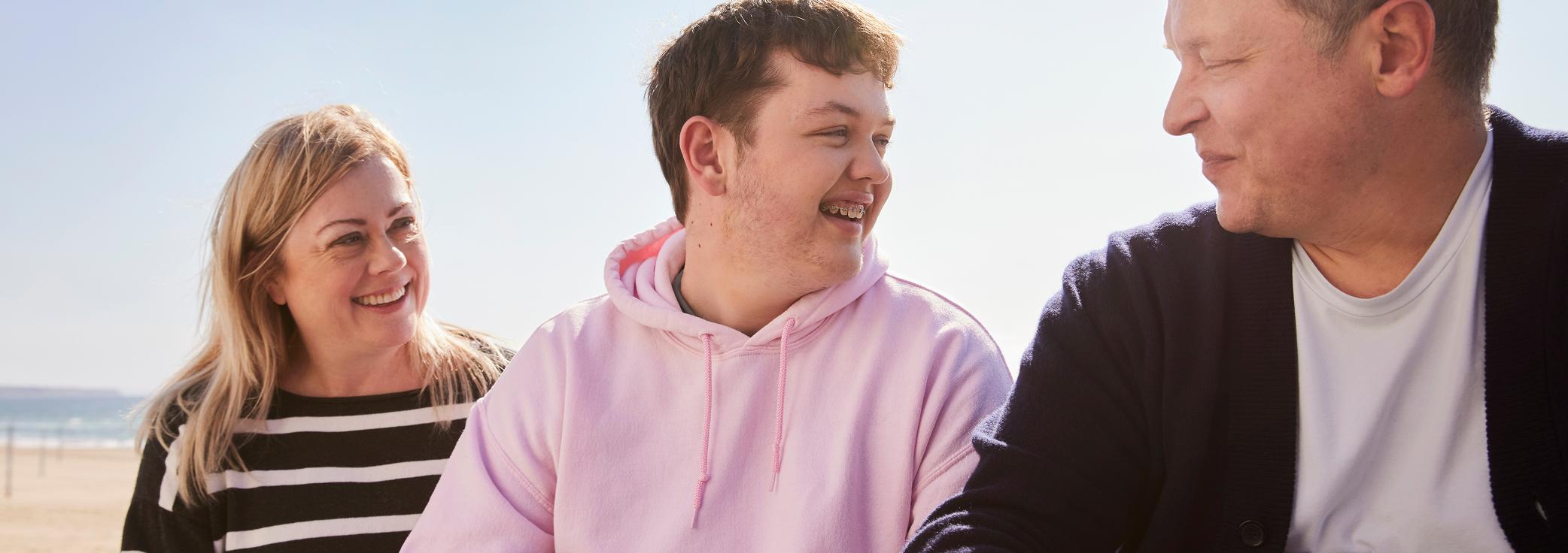 Cameron, living with LGS, sharing time with his mother and father